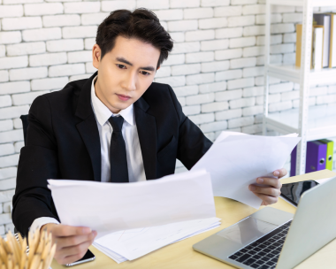 A translator working on USCIS certified translations for birth, death and divorce certificates in Texas, ensuring accuracy.